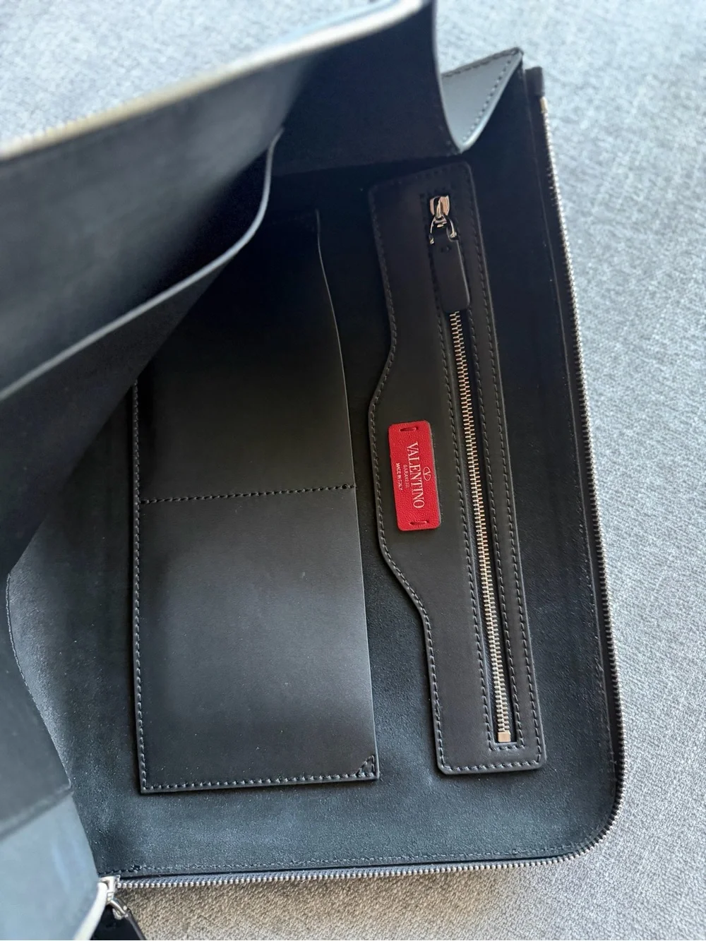 Valentino Garavani VLTN Black Leather Zip Pouch with Stud Accents